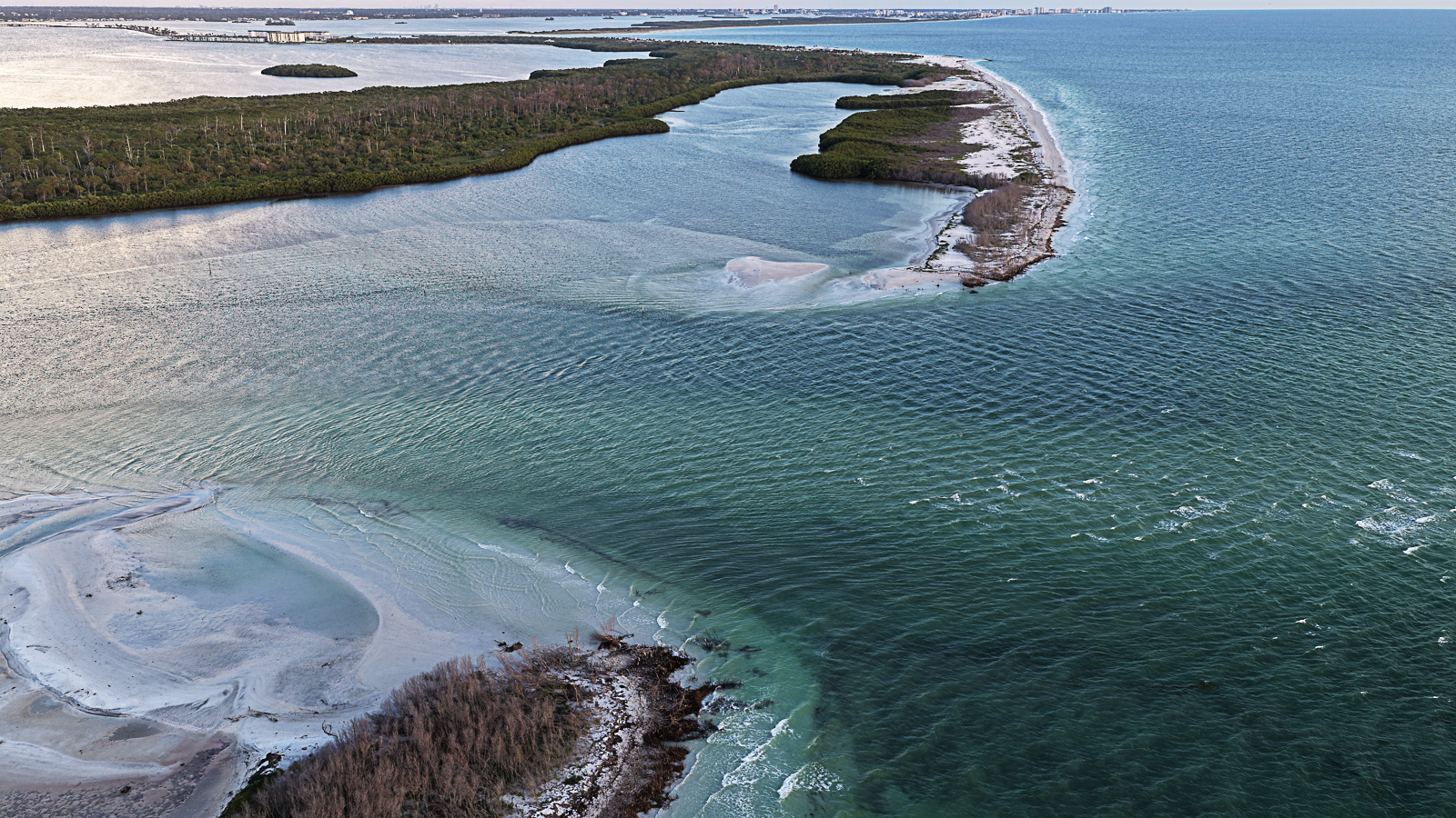 Break in Honeymoon Island forming Oystercatcher Key after the 2024 storms near Dunedin, Florida featured by Mark Middleton Tampa Bay Realtor with Compass